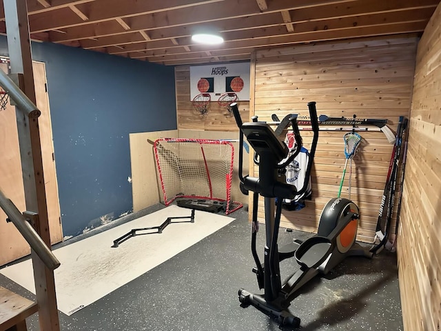 exercise room with wooden walls