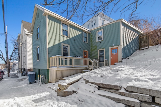 view of snow covered house