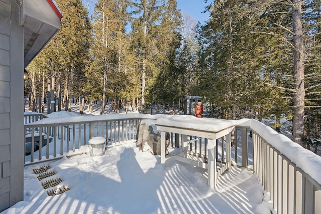 view of snow covered deck