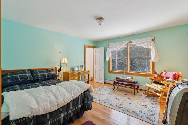 bedroom with hardwood / wood-style flooring