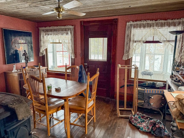 dining area featuring hardwood / wood-style floors, plenty of natural light, wooden ceiling, and ceiling fan