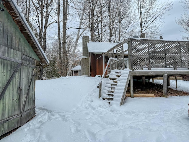 view of yard covered in snow