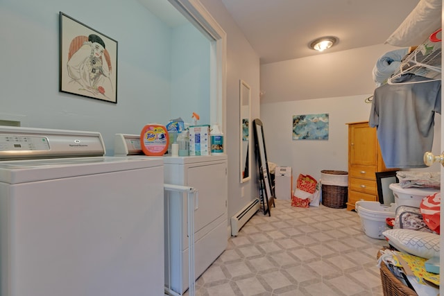 laundry room featuring washing machine and clothes dryer and a baseboard radiator