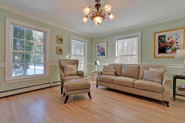 living room with light wood-type flooring, crown molding, a notable chandelier, and baseboard heating
