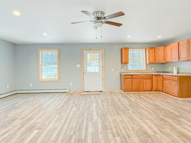 21 Coolidge Rd, Dixfield, ME 04224 - kitchen with a sink, baseboards, light wood-style floors, and recessed lighting