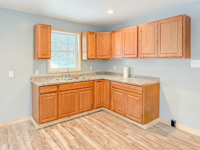 21 Coolidge Rd, Dixfield, ME 04224 - kitchen with a sink, baseboards, recessed lighting, and light wood-style flooring