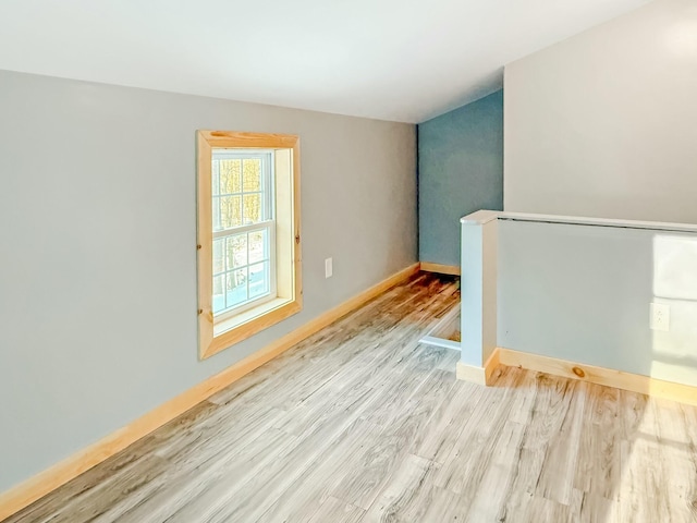 21 Coolidge Rd, Dixfield, ME 04224 - empty room with baseboards and wood finished floors