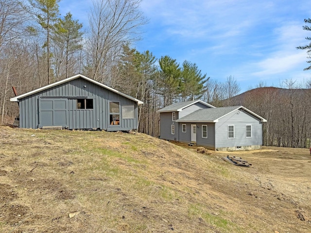21 Coolidge Rd, Dixfield, ME 04224 - exterior space with board and batten siding