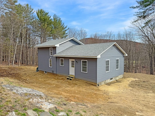 21 Coolidge Rd, Dixfield, ME 04224 - exterior space featuring a shingled roof and entry steps