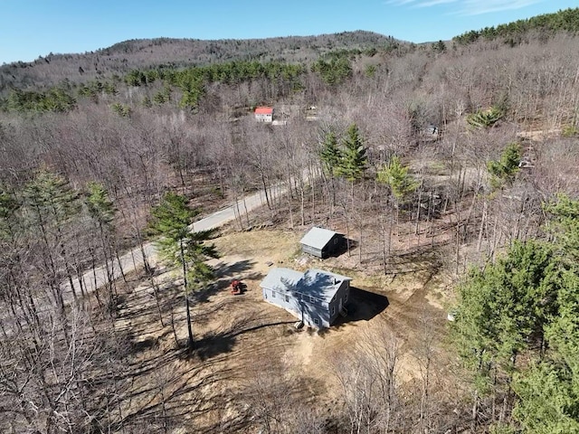 21 Coolidge Rd, Dixfield, ME 04224 - aerial view featuring a wooded view