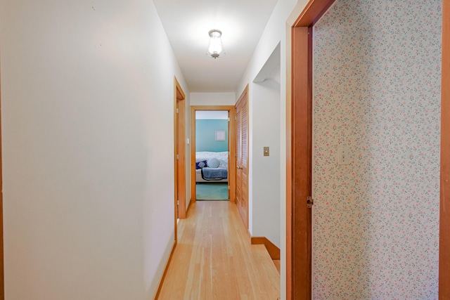 corridor featuring light hardwood / wood-style flooring