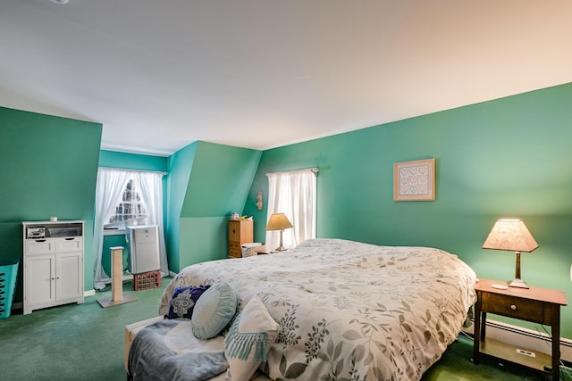 carpeted bedroom featuring baseboard heating