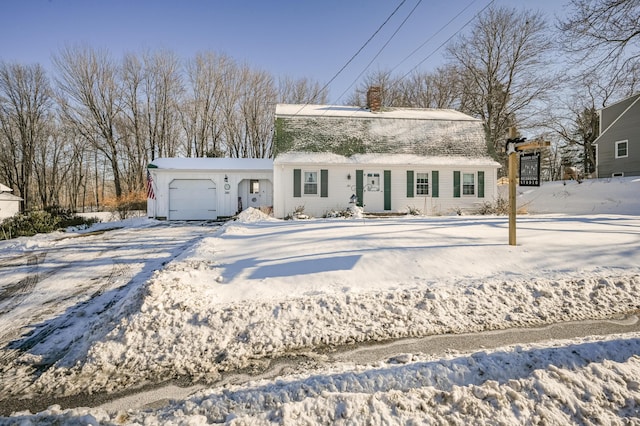 front of property with a garage