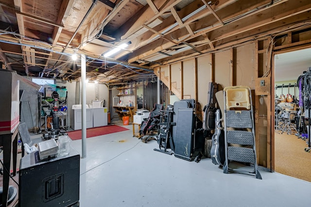 basement with washer and dryer