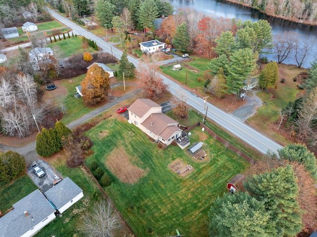 bird's eye view with a water view