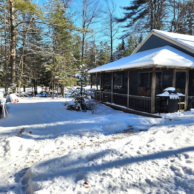 exterior space with a sunroom