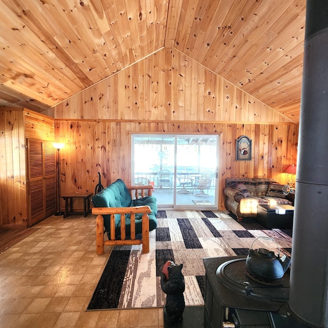 bedroom with vaulted ceiling, access to exterior, wooden walls, and wood ceiling