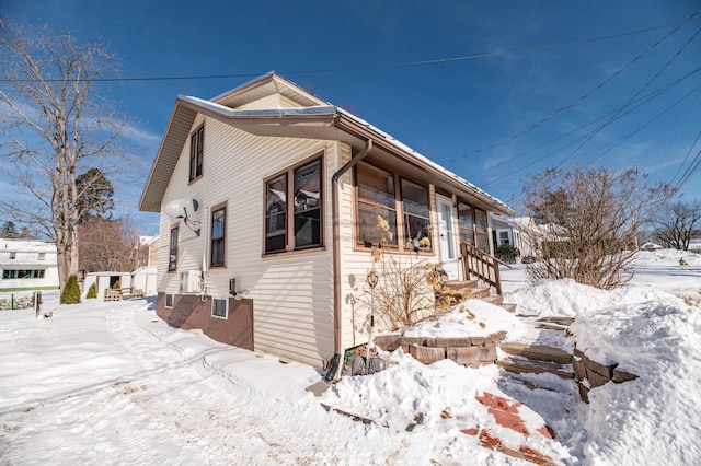 view of snow covered property