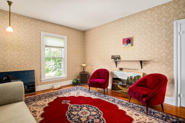 living area with wood-type flooring