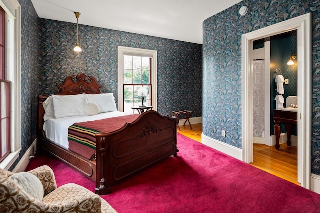 bedroom featuring hardwood / wood-style flooring