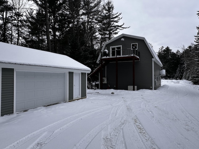 view of snow covered garage