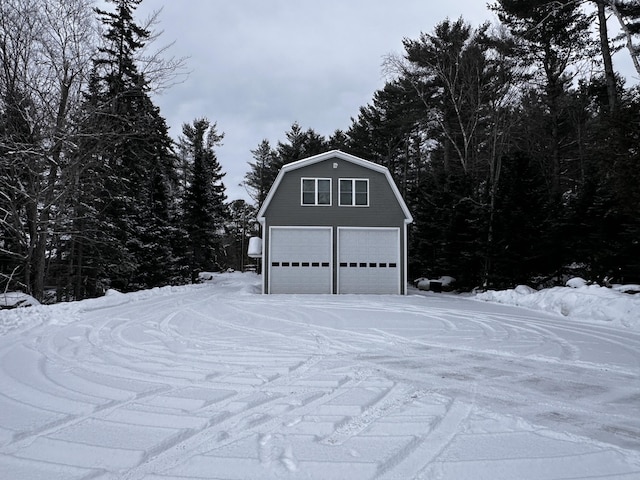 view of snow covered garage