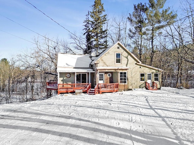 view of front of home featuring a wooden deck