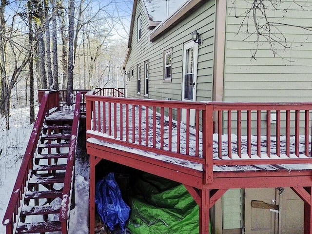 view of snow covered deck