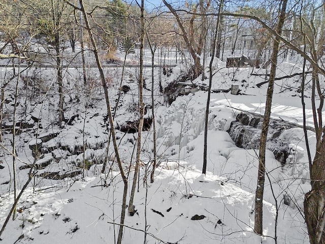 view of snow covered land