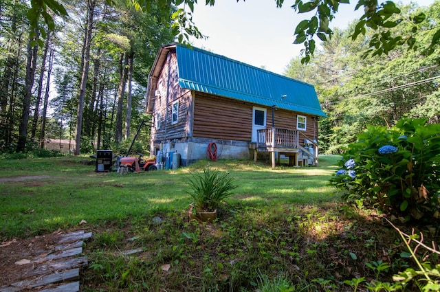 exterior space with a yard