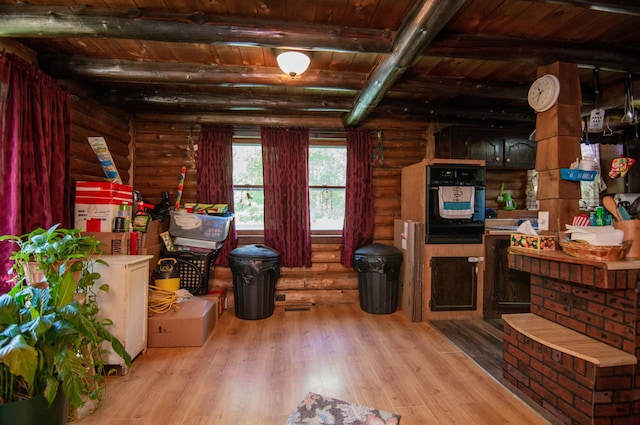 misc room with beam ceiling, wood ceiling, and light hardwood / wood-style floors