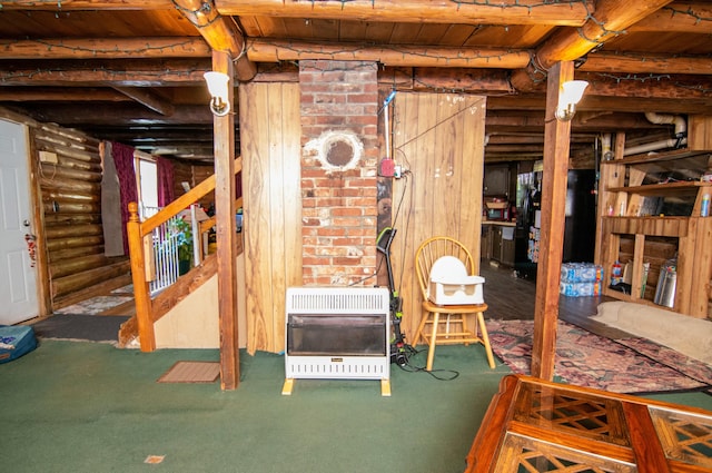 basement with carpet floors, heating unit, wooden ceiling, and black refrigerator