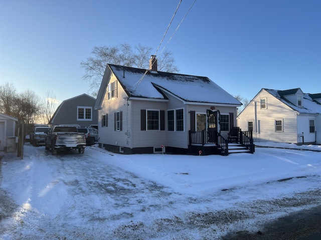 view of snow covered house