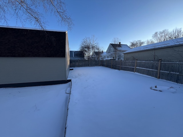 view of yard covered in snow