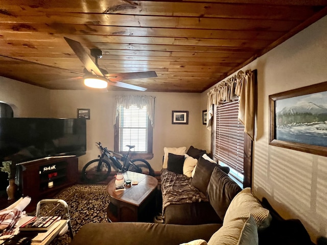 living room with wooden ceiling and ceiling fan