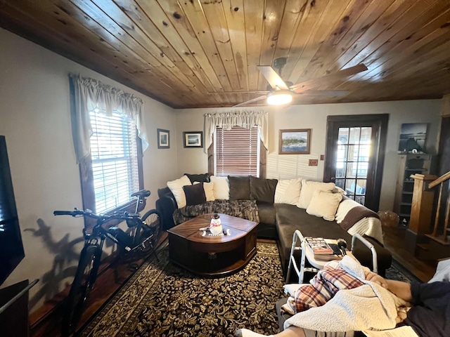 living room featuring wooden ceiling and ceiling fan