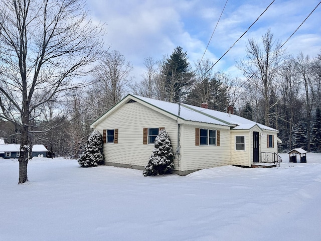 view of snow covered property