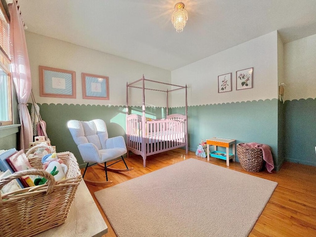 bedroom with hardwood / wood-style floors