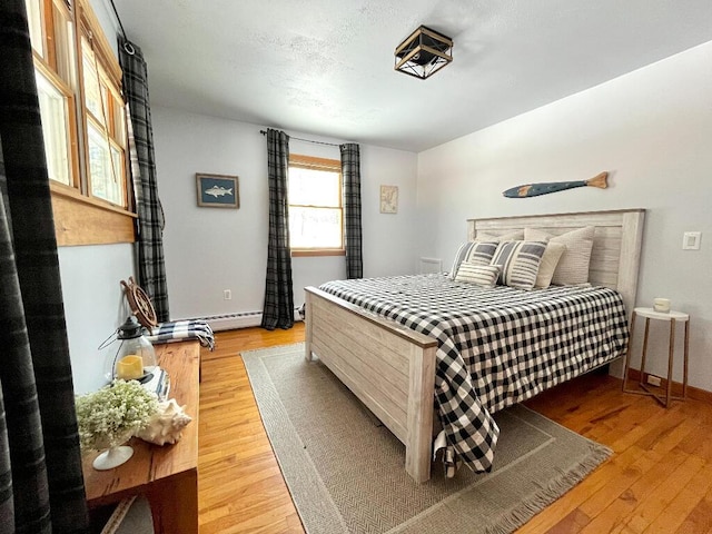 bedroom featuring light hardwood / wood-style flooring