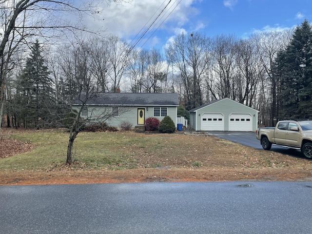 11 Partridge Dr, Gardiner, ME 04345 - view of front of home featuring a chimney, an outdoor structure, and a detached garage
