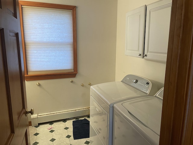11 Partridge Dr, Gardiner, ME 04345 - clothes washing area featuring cabinet space, a baseboard radiator, tile patterned floors, and washing machine and dryer