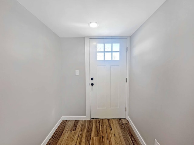 doorway to outside with hardwood / wood-style floors