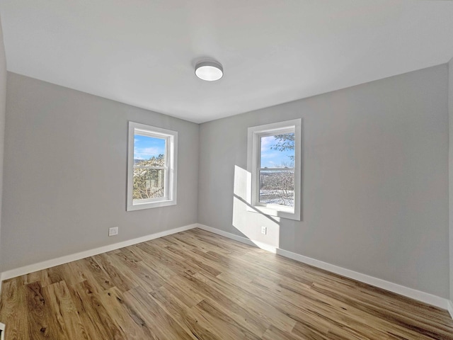 empty room featuring light hardwood / wood-style floors