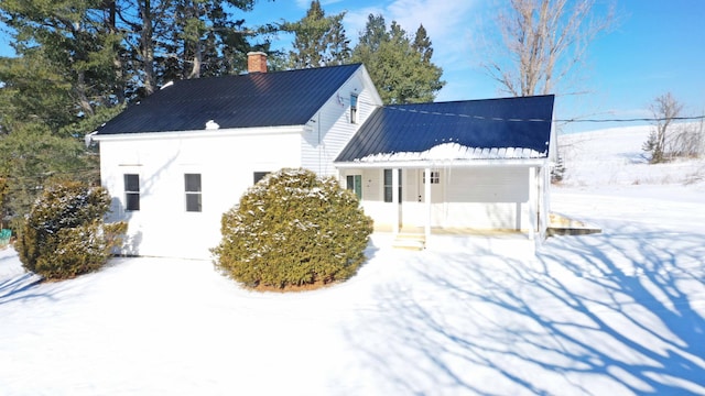 view of snow covered property