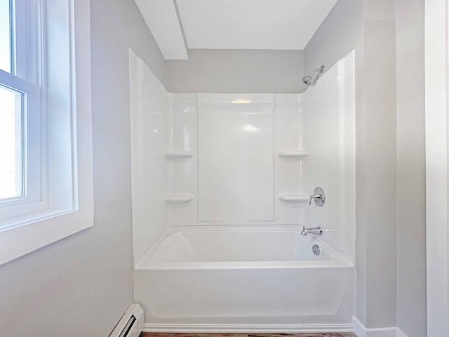 bathroom with shower / bath combination