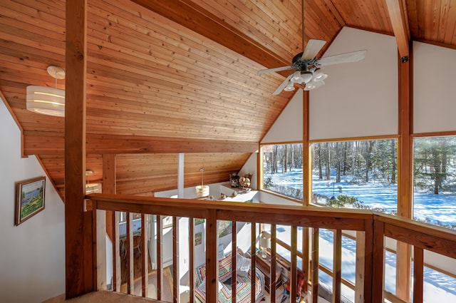 additional living space featuring high vaulted ceiling, a healthy amount of sunlight, wooden ceiling, and ceiling fan