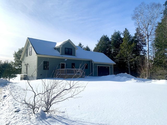 view of front of home with covered porch and an attached garage