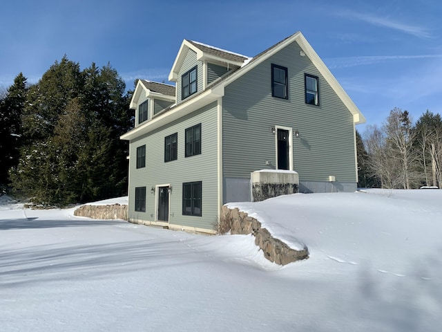 view of snow covered property