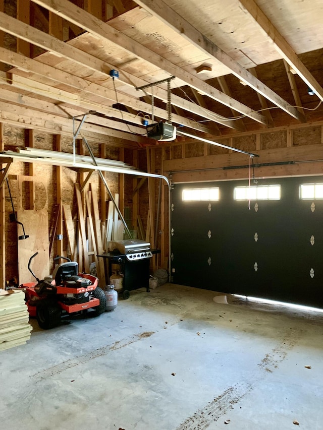 garage featuring a garage door opener