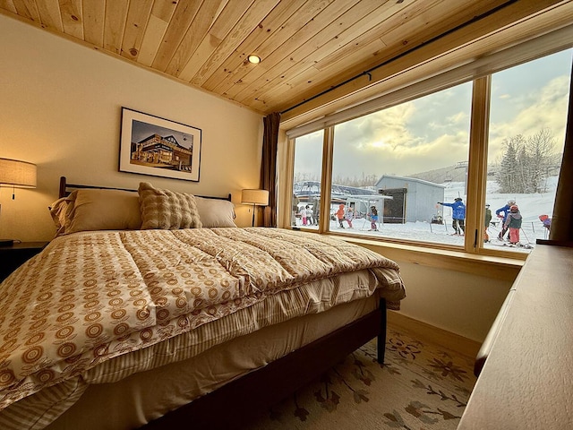 bedroom with wooden ceiling